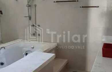 Imagem 3: Linda casa térrea em condomínio com 4 suítes todas com closet e 2 delas...