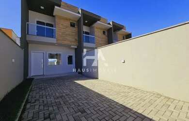 Imagem: A casa possui 2 Dormitórios, 3 Banheiros, 2 Vagas na garagem