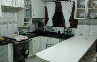 Imagem: A casa possui 3 Dormitórios, 4 Banheiros, 2 Vagas na garagem