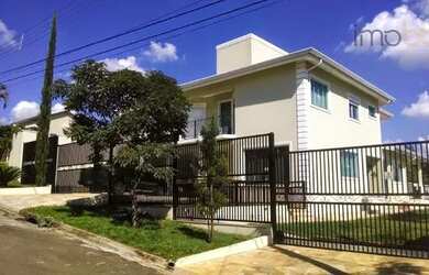 Imagem: A casa em condomínio possui 4 Dormitórios, 5 Banheiros, 4