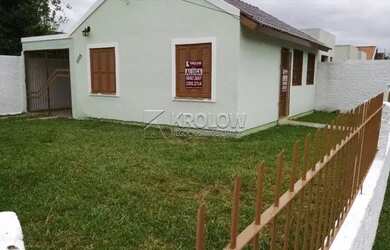 Imagem: A casa possui 2 Dormitórios, 1 Banheiro, 1 Vaga na garagem