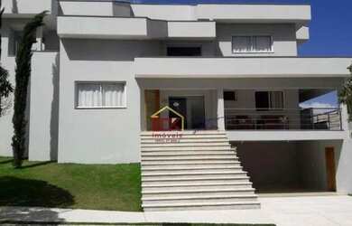 Imagem: A casa em condomínio possui 5 Dormitórios, 4 Banheiros, 4