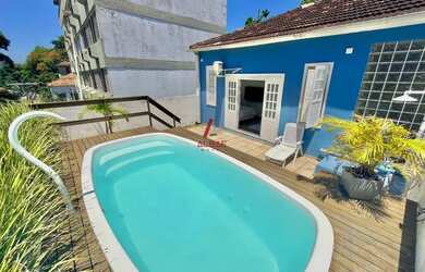 Imagem: A casa possui 4 Dormitórios, 4 Banheiros, 2 Vagas na garagem