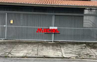 Imagem: A casa possui 3 Dormitórios, 2 Banheiros, 3 Vagas na garagem