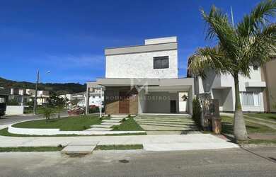 Imagem: A casa em condomínio possui 3 Dormitórios, 4 Banheiros, 2