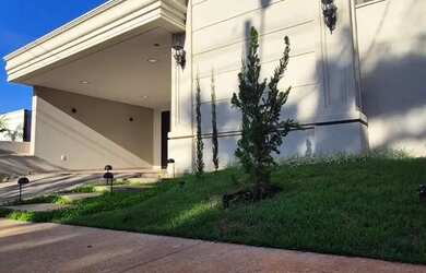 Imagem: A casa possui 3 Dormitórios, 4 Banheiros, 2 Vagas na garagem