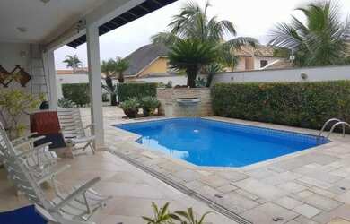 Imagem: A casa possui 3 Dormitórios, 5 Banheiros, 5 Vagas na garagem