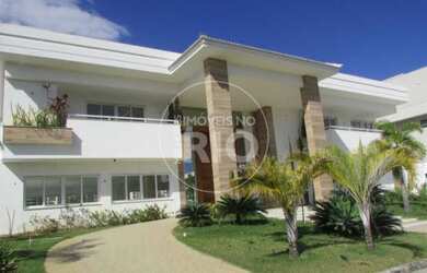 Imagem: A casa em condomínio possui 4 Dormitórios, 5 Banheiros, 5