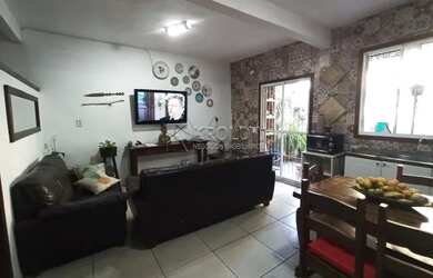 Imagem: A casa possui 3 Dormitórios, 2 Banheiros, 1 Vaga na garagem