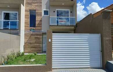 Imagem: A casa possui 3 Dormitórios, 3 Banheiros, 2 Vagas na garagem