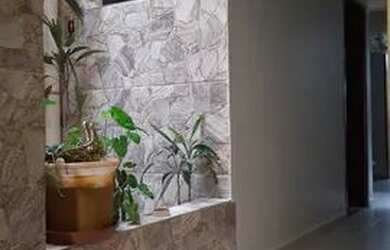 Imagem: A casa possui 3 Dormitórios, 2 Banheiros e está localizado