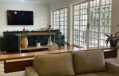 Imagem: A casa possui 4 Dormitórios, 5 Banheiros, 4 Vagas na garagem