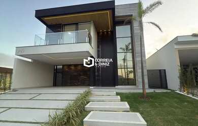 Imagem: A casa possui 4 Dormitórios, 5 Banheiros, 4 Vagas na garagem