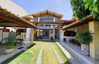 Imagem: A casa possui 5 Dormitórios, 5 Banheiros, 5 Vagas na garagem