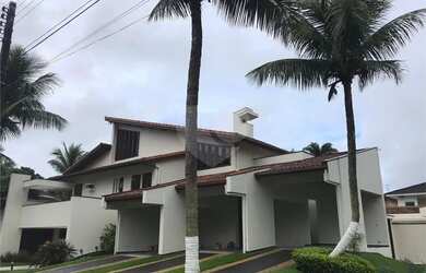 Imagem: A casa possui 5 Dormitórios, 5 Banheiros, 5 Vagas na garagem