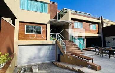 Imagem: A casa em condomínio possui 5 Dormitórios, 5 Banheiros, 5