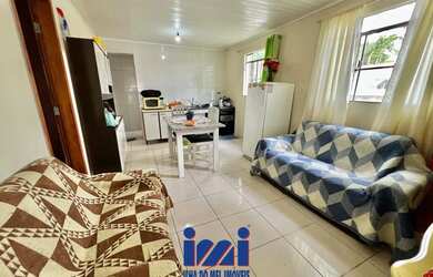 Imagem 6: Duas casas a venda na praia