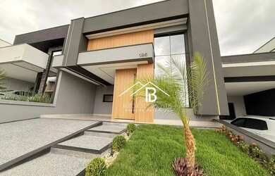 Imagem: A casa possui 3 Dormitórios, 2 Banheiros, 3 Vagas na garagem