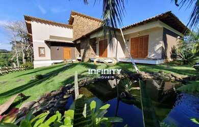 Imagem: A casa em condomínio possui 5 Dormitórios, 5 Banheiros, 5