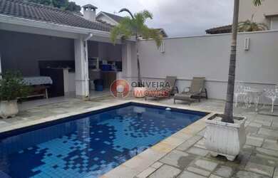 Imagem: A casa em condomínio possui 4 Dormitórios, 5 Banheiros, 2