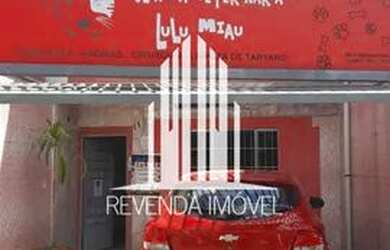 Imagem: A casa possui 4 Dormitórios, 1 Banheiro, 2 Vagas na garagem