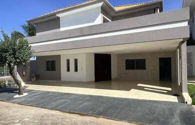 Imagem: A casa em condomínio possui 4 Dormitórios, 5 Banheiros, 416m²