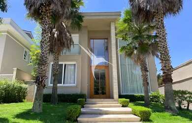 Imagem: A casa possui 4 Dormitórios, 4 Banheiros, 4 Vagas na garagem