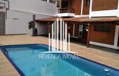 Imagem: A casa em condomínio possui 4 Dormitórios, 3 Banheiros, 3