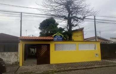 Imagem: A casa possui 2 Dormitórios, 2 Banheiros, 3 Vagas na garagem