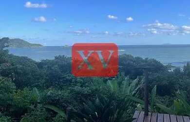 Imagem: A casa possui 5 Dormitórios, 5 Banheiros, 4 Vagas na garagem