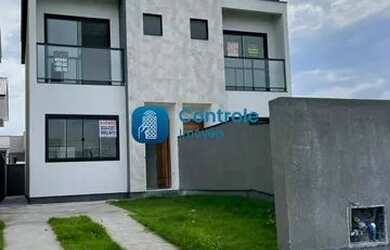 Imagem: A casa possui 2 Dormitórios, 3 Banheiros, 2 Vagas na garagem