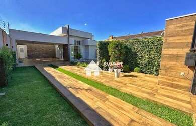 Imagem: A casa possui 3 Dormitórios, 2 Banheiros, 5 Vagas na garagem