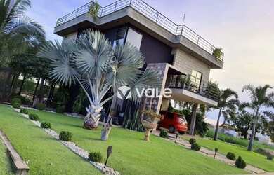 Imagem: A casa em condomínio possui 4 Dormitórios, 3 Banheiros, 4