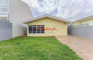 Imagem: A casa possui 3 Dormitórios, 1 Banheiro, 2 Vagas na garagem