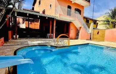 Imagem: A casa possui 4 Dormitórios, 2 Banheiros, 4 Vagas na garagem