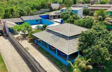 Imagem: A casa em condomínio possui 4 Dormitórios, 4 Banheiros, 5