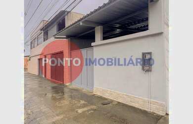 Imagem: A casa possui 2 Dormitórios, 1 Banheiro, 2 Vagas na garagem