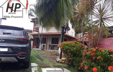 Imagem: A casa possui 5 Dormitórios, 5 Banheiros, 5 Vagas na garagem