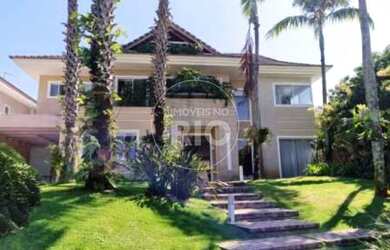 Imagem: A casa em condomínio possui 5 Dormitórios, 5 Banheiros, 4