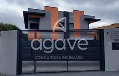 Imagem: A casa possui 3 Dormitórios, 1 Banheiro, 2 Vagas na garagem