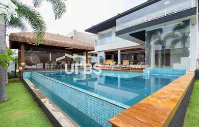 Imagem: A casa possui 5 Dormitórios, 5 Banheiros, 5 Vagas na garagem