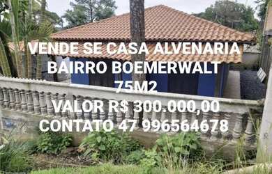 Imagem: A casa possui 2 Dormitórios, 2 Banheiros, 3 Vagas na garagem