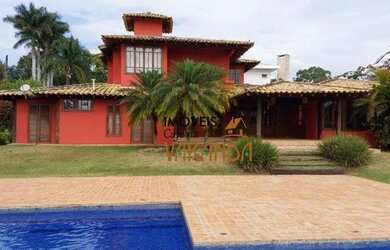 Imagem: A casa em condomínio possui 5 Dormitórios, 5 Banheiros, 5