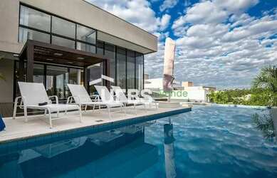 Imagem: A casa possui 4 Dormitórios, 4 Banheiros, 610m² de Área e