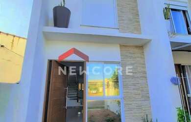 Imagem: A casa possui 2 Dormitórios, 3 Banheiros, 1 Vaga na garagem