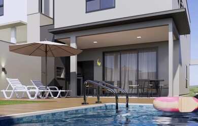 Imagem: A casa possui 3 Dormitórios, 4 Banheiros, 2 Vagas na garagem