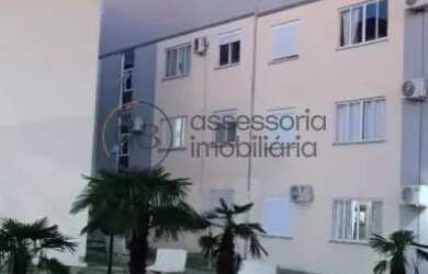 Imagem: O apartamento possui 2 Dormitórios, 1 Banheiro, 2 Vagas na