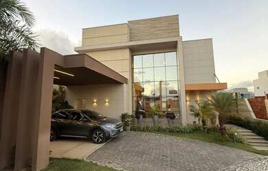 Imagem: A casa em condomínio possui 3 Dormitórios, 5 Banheiros e 390m²