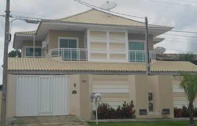 Imagem: A casa possui 4 Dormitórios, 4 Banheiros, 2 Vagas na garagem