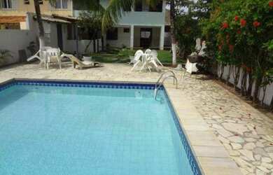 Imagem: A casa possui 4 Dormitórios, 3 Banheiros, 4 Vagas na garagem